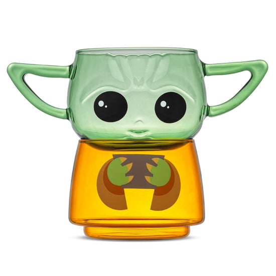 Two small drinking glasses stacked on each other against a white background. The two glasses combined depict the character Grogu from the Star Wars series The Mandalorian. The top glass has two handles shaped as his ears.