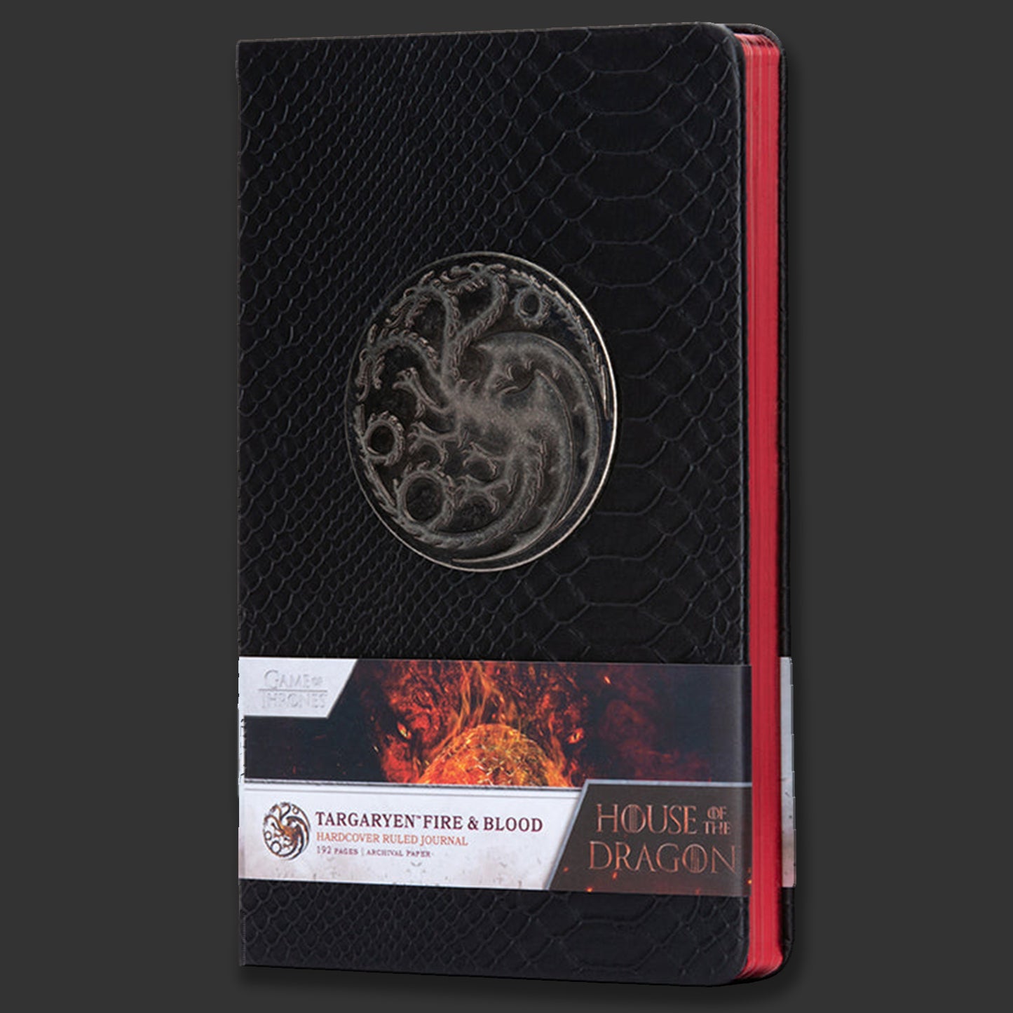 Black notebook with Targaryen emblem and 'House of the Dragon' branding on a dark background