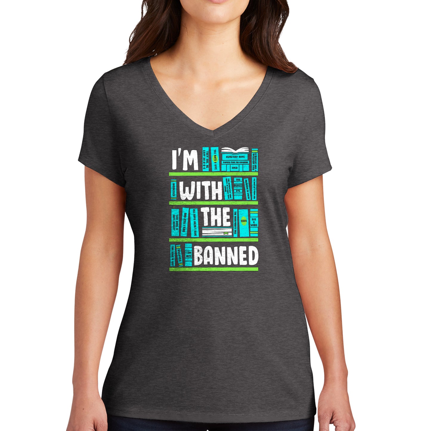 A female model wearing a grey T-shirt. There are four green bookshelves with light blue book spines covering each. The words "I'm With The Banned" are spread out across the four bookshelves in white text.