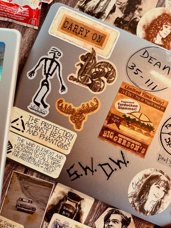 A collage of stickers depicting iconic images and characters from the TV series "Supernatural."