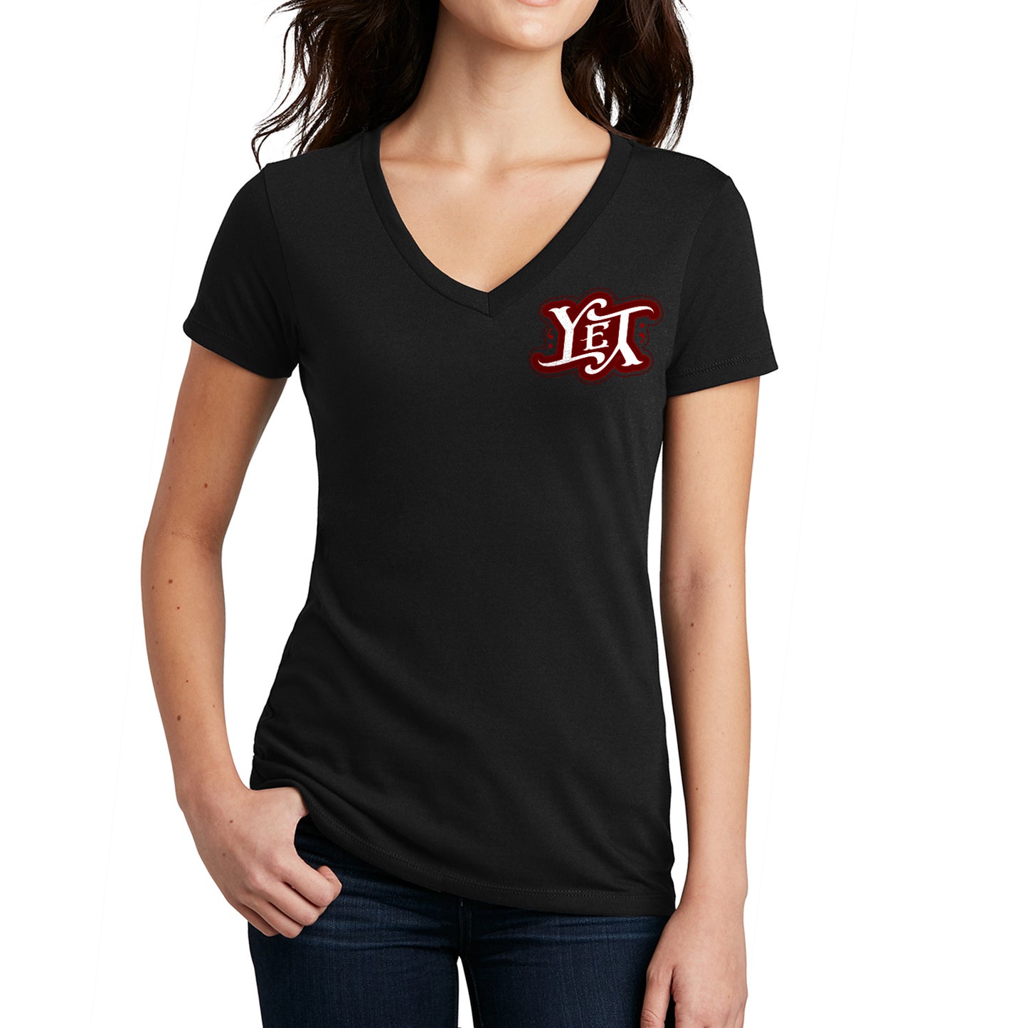 A female model wearing a black v-neck shirt. On the left side are the letters YET in white, outlined in red. The letters are designed to spell the word "yet" right side up and upside down.