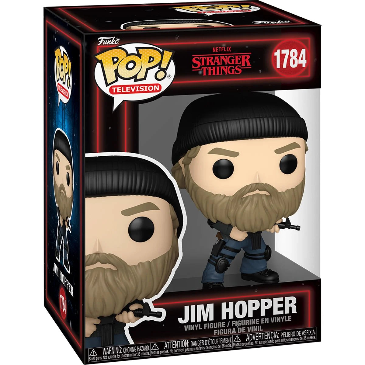 A cardboard box with a transparent front, containing a bobblehead figure depicting Jim Hopper from the TV series Stranger Things. He is wearing black tactical military gear with a black beanie, and carrying a rifle.