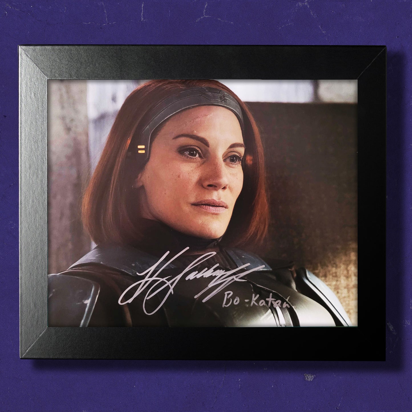 A framed image of Bo Katan from The Mandalorian, signed by actor Katee Sackhoff