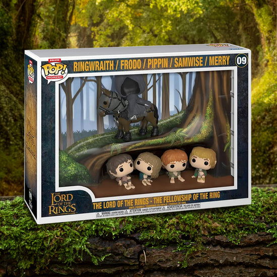 Funko Pop! packaging for 'The Lord of the Rings' figures in a forest setting. The box is sitting on a mossy log in a forest