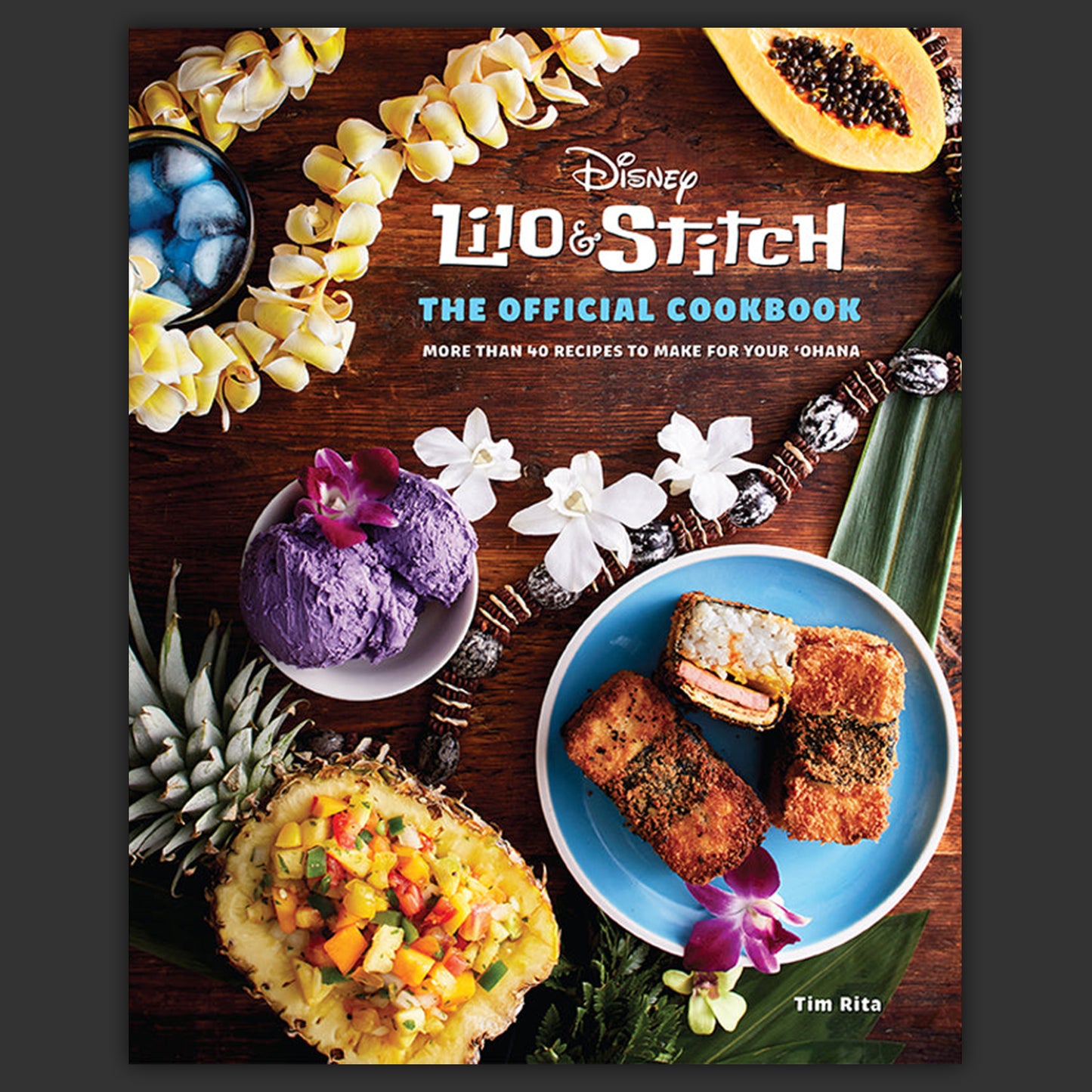 Disney Lilo & Stitch cookbook cover with food images and wooden background