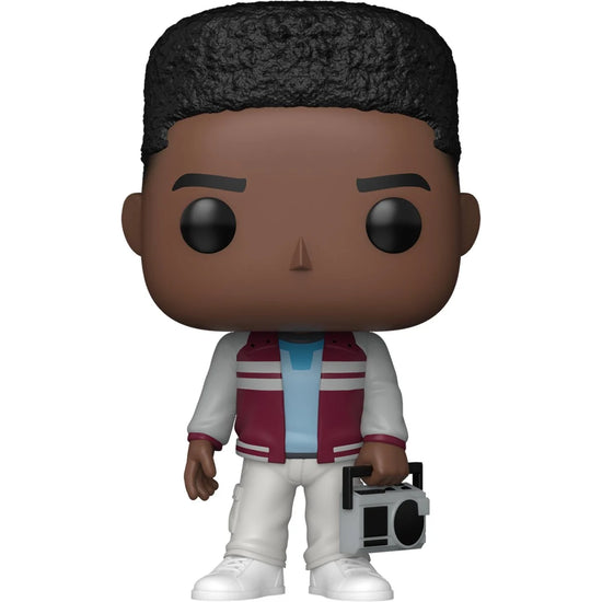 A bobblehead figure depicting Lucas Sinclair from the TV series Stranger Things, against a white background. He is wearing white pants and a maroon jacket, and carrying a radio in one hand.