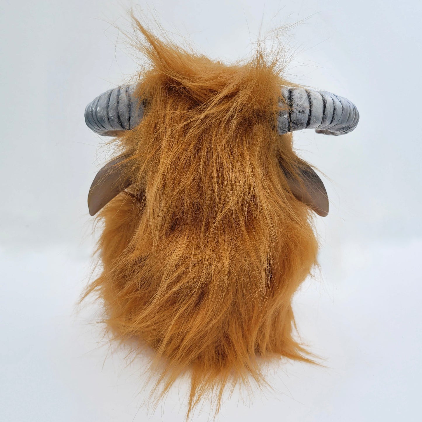 Rear angle view of a plushie depicting the character Ludo from the movie "Labyrinth."