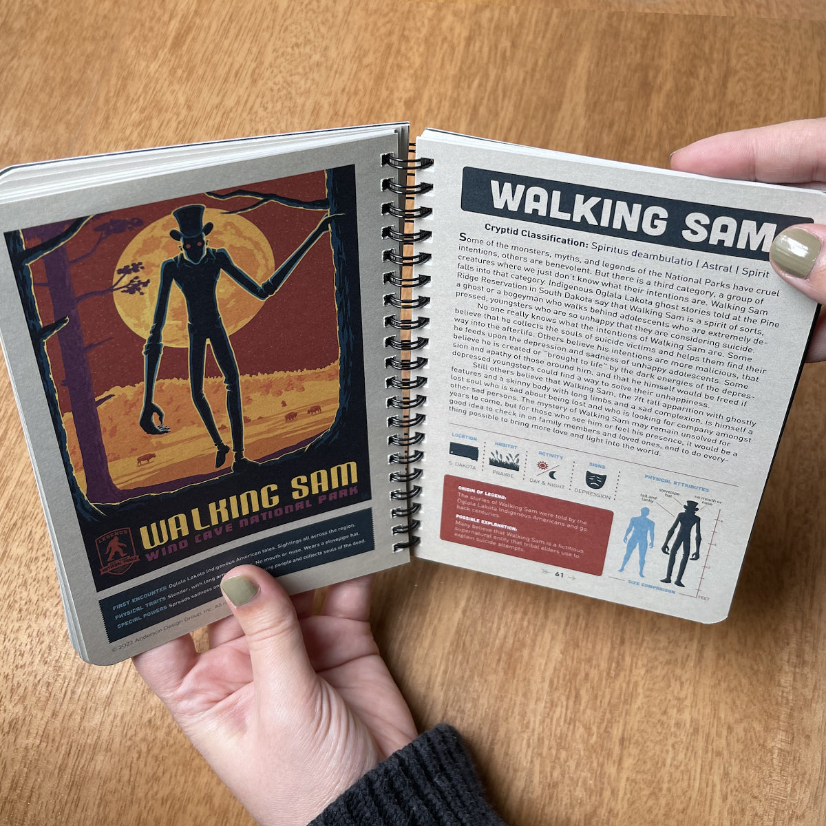 Open book with 'Walking Sam' cover and text on a wooden surface
