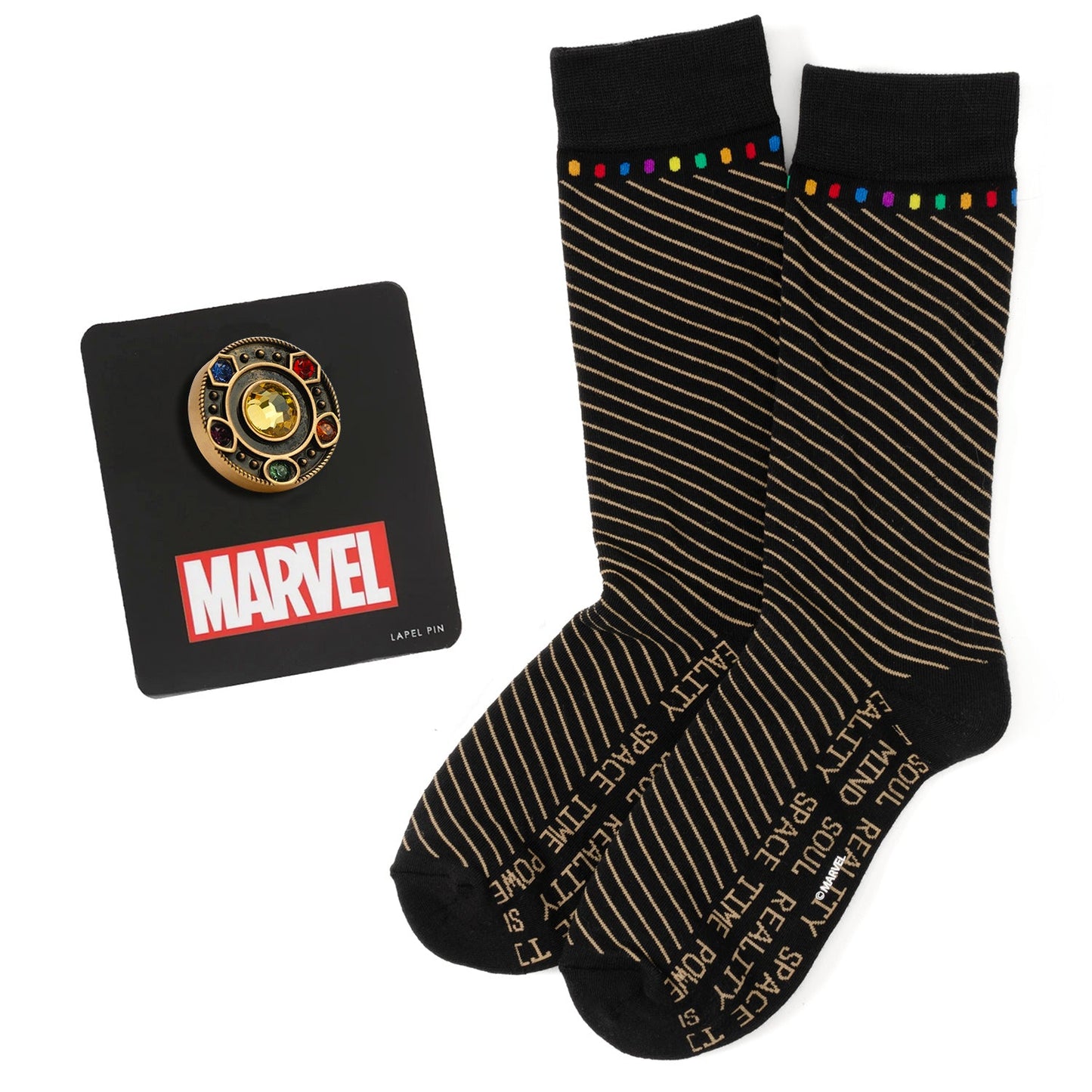 Marvel pin and black socks with gold text on a white background. Next to the socks is a gold lapel pic depicting the Infinity stones
