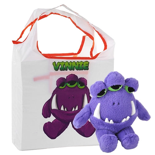 An image of a purple plushie against a white background. The plushie has three half-opened green eyes at the top of his head, and long white fangs sticking out of his closed mouth. Short arms and legs are attached at his side and bottom. Next to the plushie is a white bag with a drawing of the plushie on the front. Green text at the top says the plushie's name, "Vinnie."