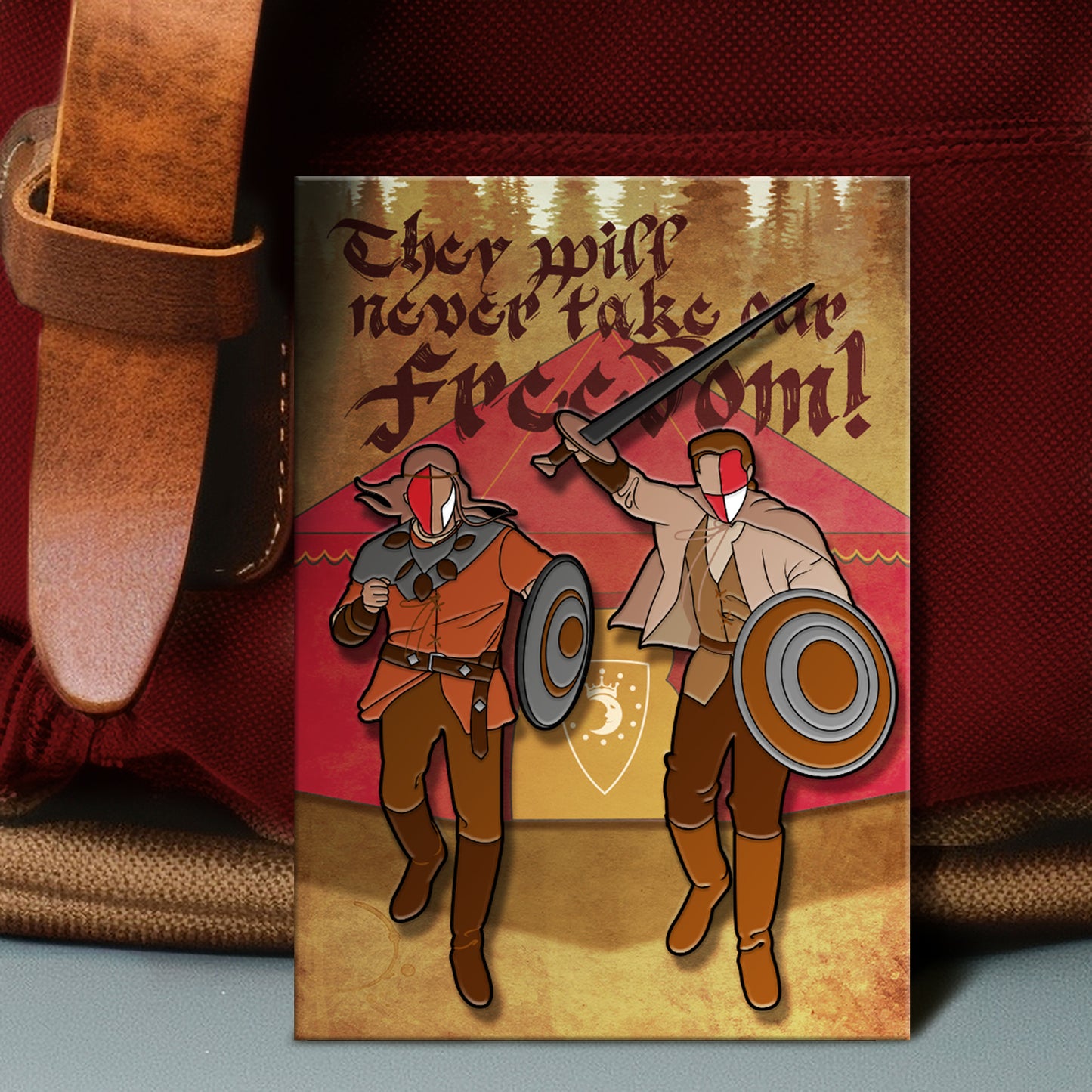 Two pins on a backing card depicting Sam and Dean from Supernatural in their Moondoor costumes