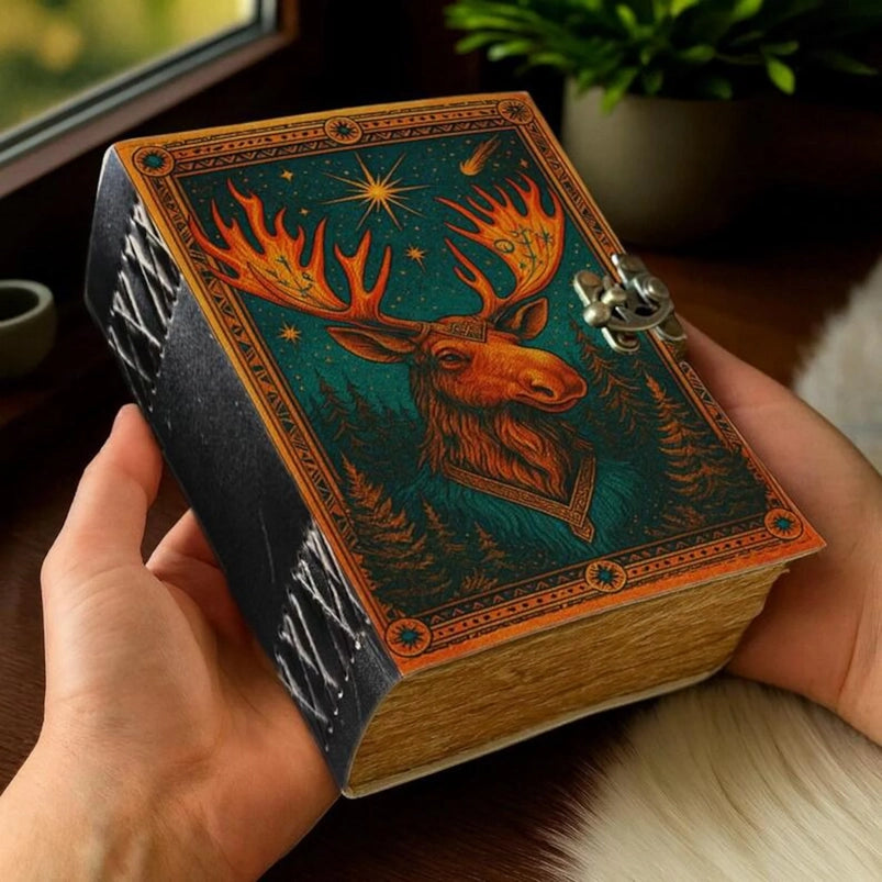 A leather journal featuring an image of a moose on the cover