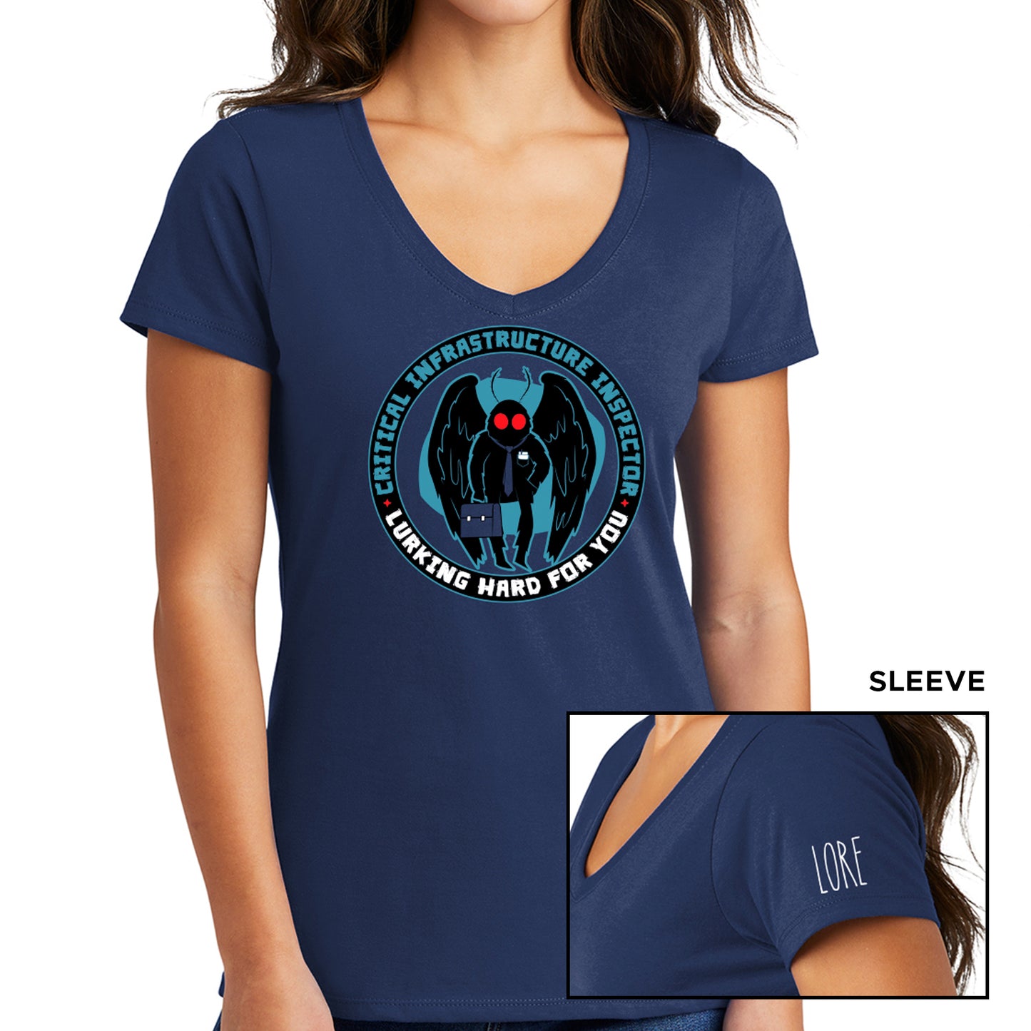 A female model wearing a navy, short-sleeved, V-neck tee. The tee has a black ring/circle printed with the words "Critical infrastructure inspector" in dark blue font and "Working hard for you" in white font. Within the ring is a black cartoon Mothman with red eyes, a navy tie, and a navy briefcase set against a lighter shadow. One sleeve features the 'LORE' logo in white.