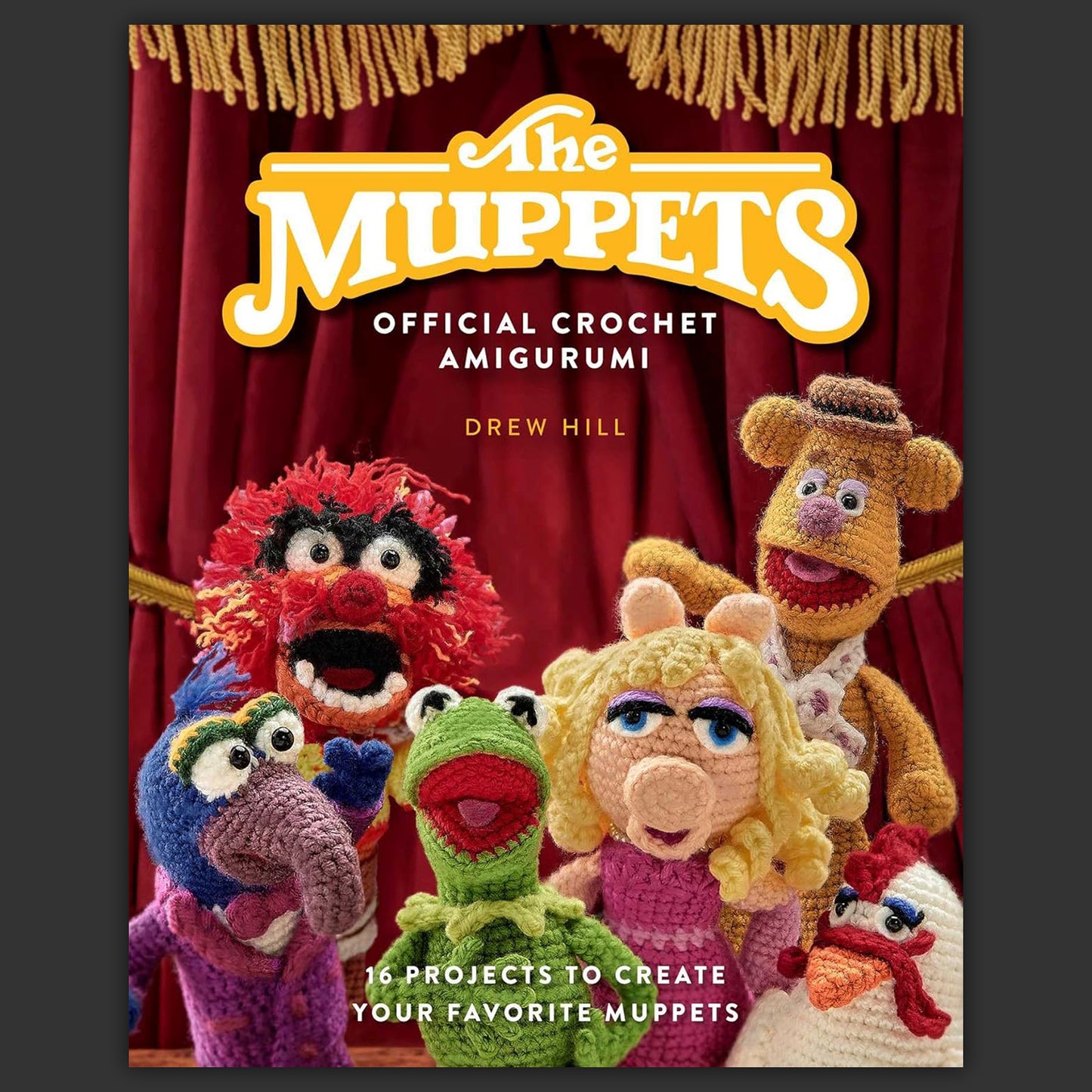 A hardcover book featuring crochet Muppets characters. Text at the top says The Muppets Official Crochet Amigurumi.