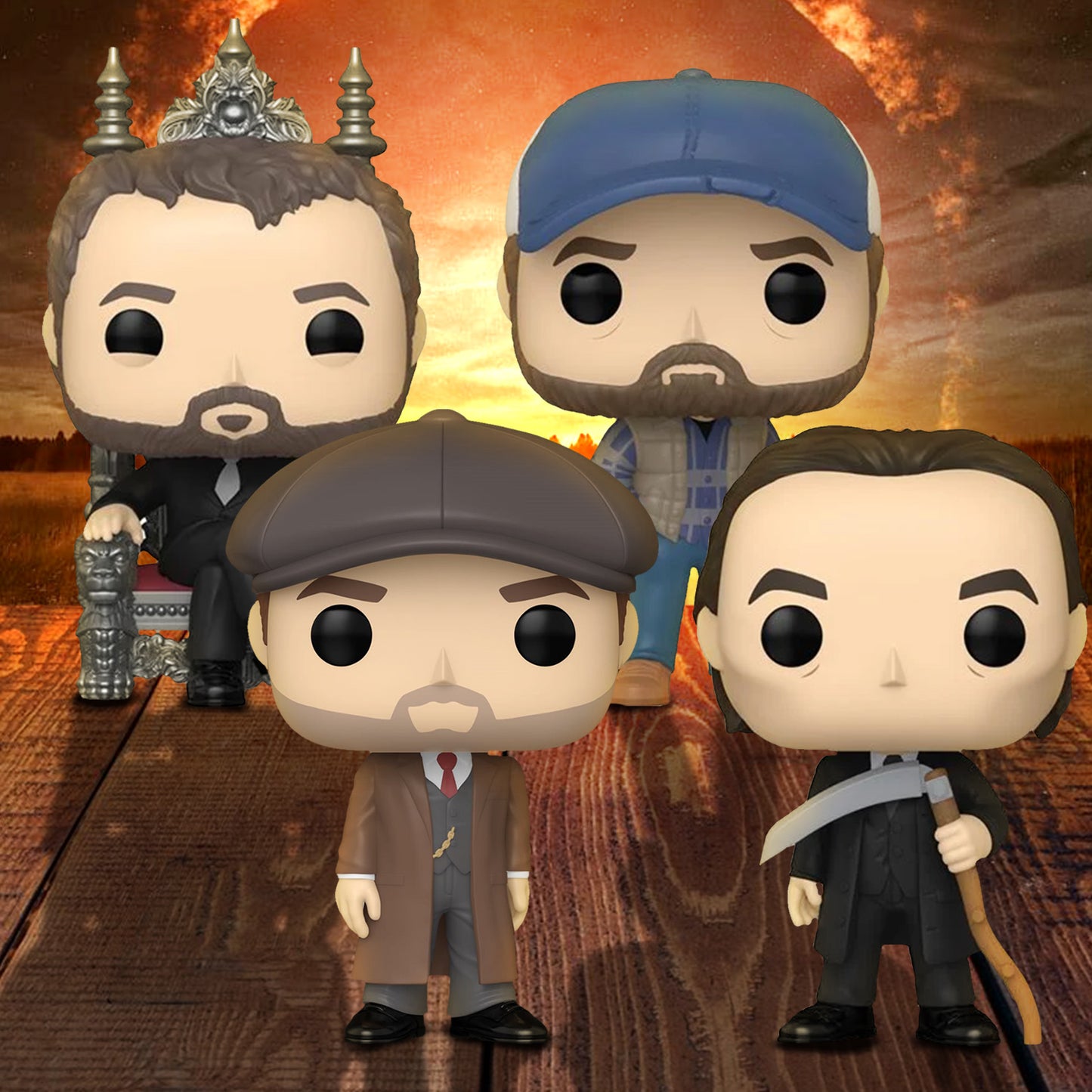 Four bobble head figures depicting characters from Supernatural, on a wooden table. Behind them is a sunset over a field.