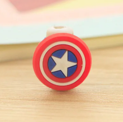 Close up view of a plastic phone charger clip, with Captain America's shield logo on the front.