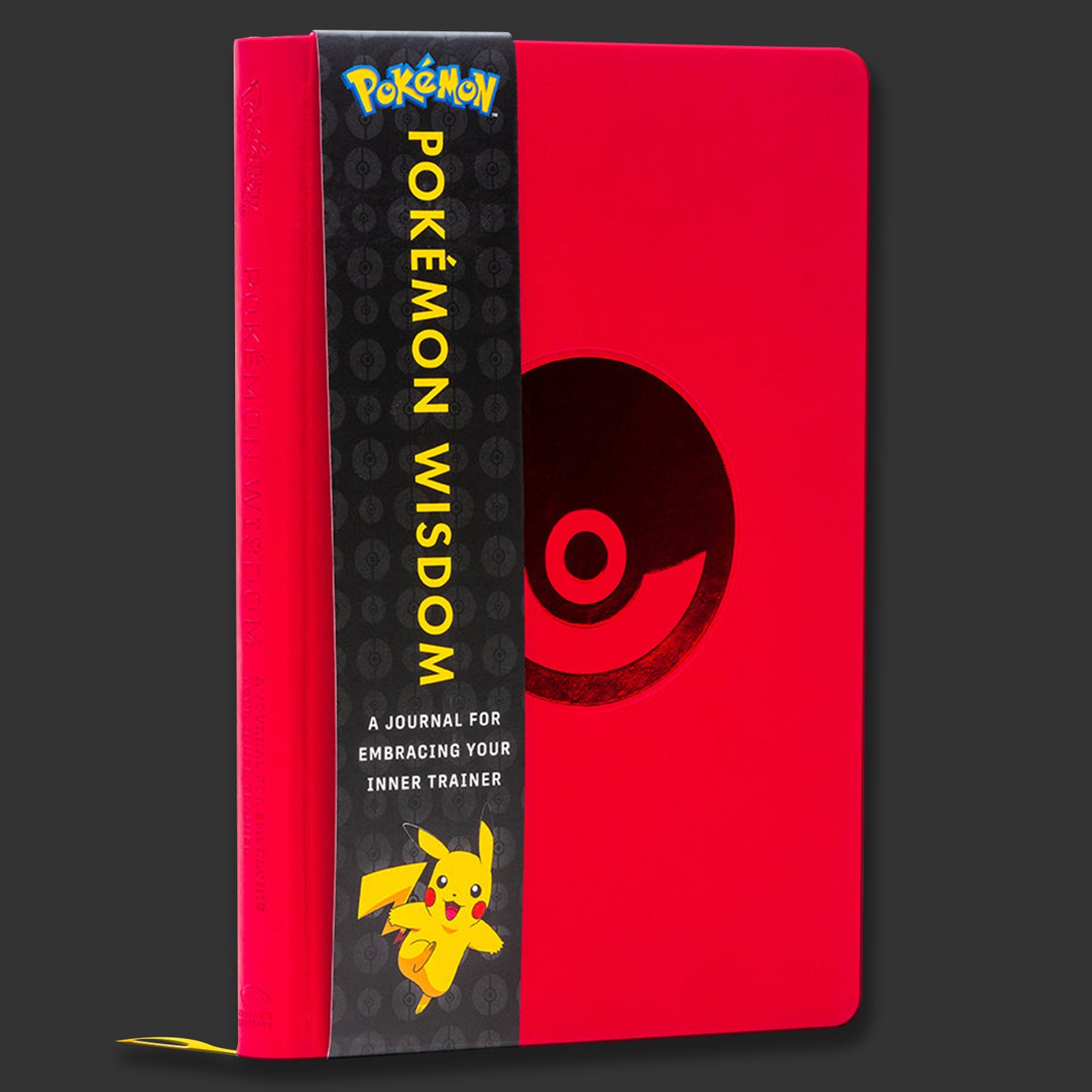 Red notebook with Pokémon branding and a Pokéball symbol on a white background