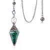 Green crystal pendant on a silver chain with decorative elements against a white background