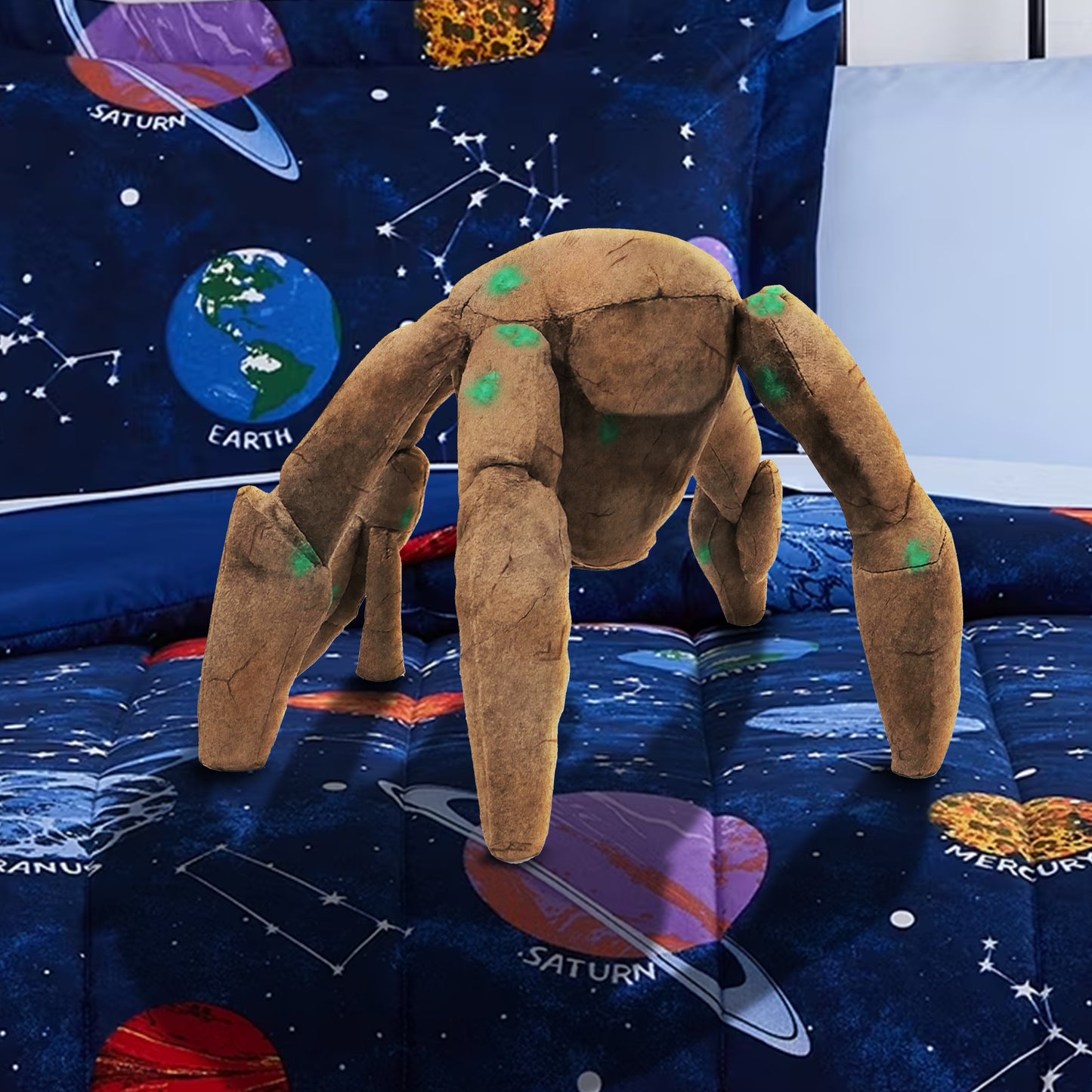 A brown and green plushie depicting the character Rocky from "Project Hail Mary."