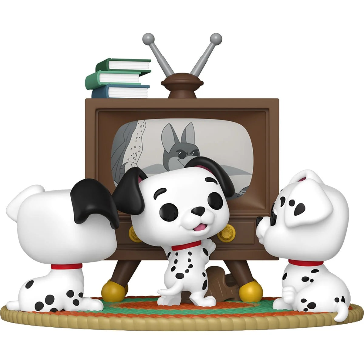 Figurines of Dalmatian dogs in front of a vintage television set on a white background