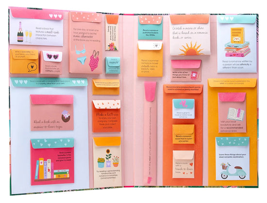 The inside of the binder, featuring little envelopes filled with reading challenges.