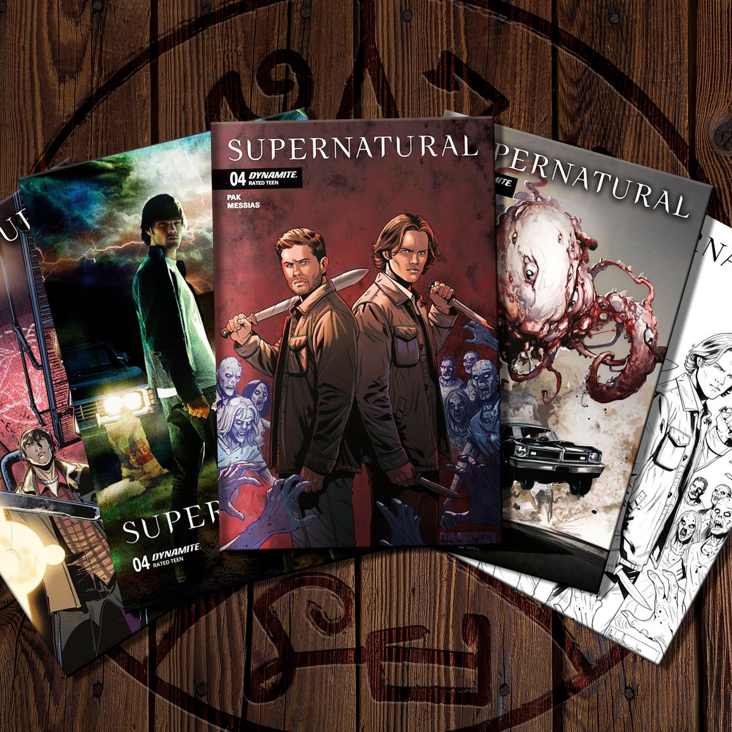 Supernatural comic books on a wooden surface
