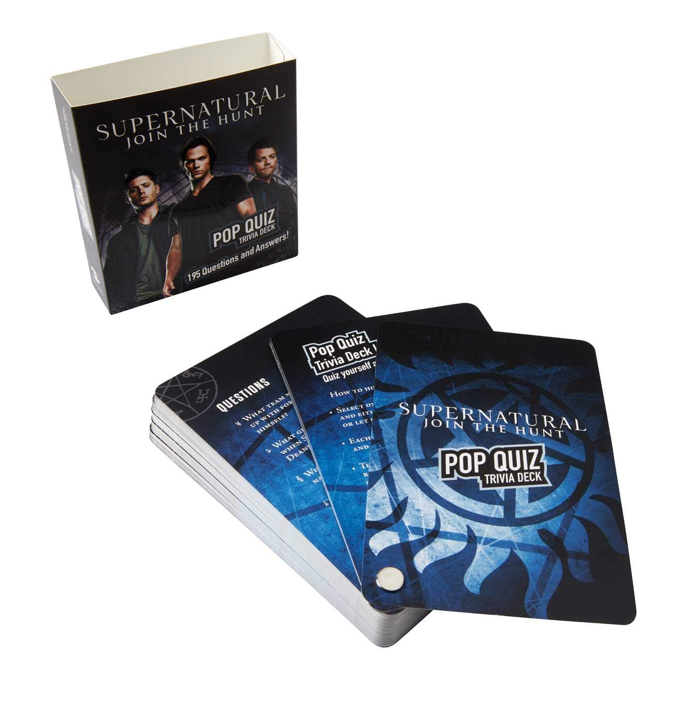 A black and blue deck of trivia cards. The background of each card depicts the anti-possession symbol in light blue, with supernatural travia questions and answers in white text. Next to the deck is a paper holder, with banner with images of Sam and Dean Winchester and Castiel on the bottom. At the top is white text saying "Supernatural: join the hunt."