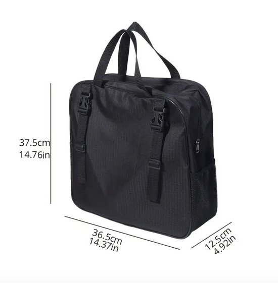 A black, square-shaped bag with a top handle and a slim silver reflective line. There are front and top zippers and a side water bottle pocket. The dimensions are 14 x 4.9 x 14.7