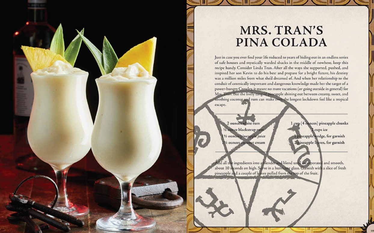 Two tall glasses containing pina coladas sit on a table, with keys and a padlock next to them. On the other side of the image is Mrs. Tran's Pina Colada recipe.
