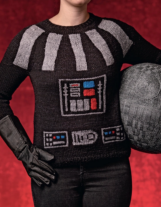 Load image into Gallery viewer, A woman wearing a knit black sweater, fashioned after the costume worn by Darth Vader from the Star Wars movies.
