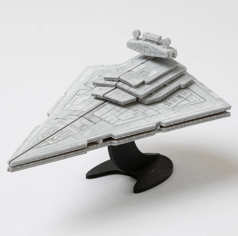 Load image into Gallery viewer, A top view of the assembled Star Destroyer model, painted in grey tones.
