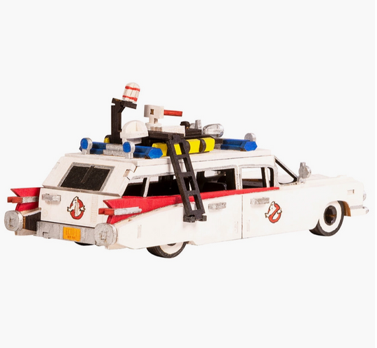An image of the assembled and painted Ectomobile from the movie Ghostbusters on a white background.