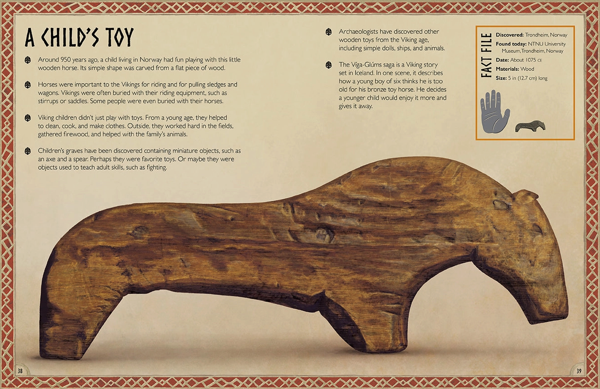 A parchment-colored book page with a red border. On the page in black text is the page title reading “A child’s toy,” with a description of the toy underneath. On the right side is an image of a carved wooden horse.