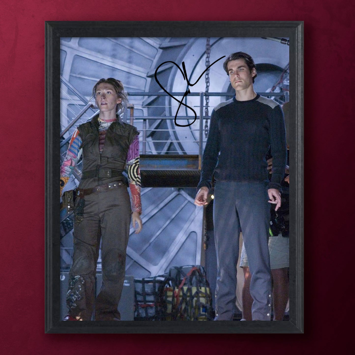 A still image from the movie "Serenity" featuring Kaylee  and Simon