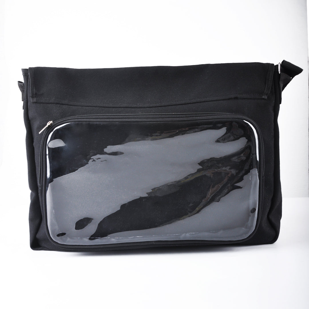 A black messanger bag against a white background. The bag is open, revealing a plastic pouch inside.