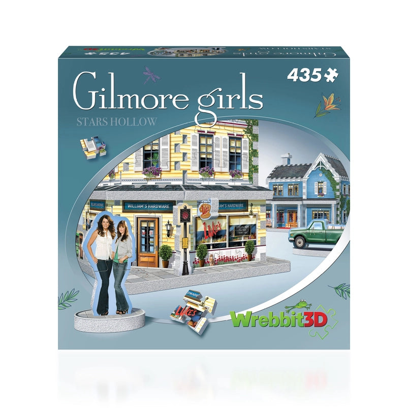A cardboard box containing a 3D jigsaw puzzle, depicting Stars Hollow from the TV series "Gilmore Girls."