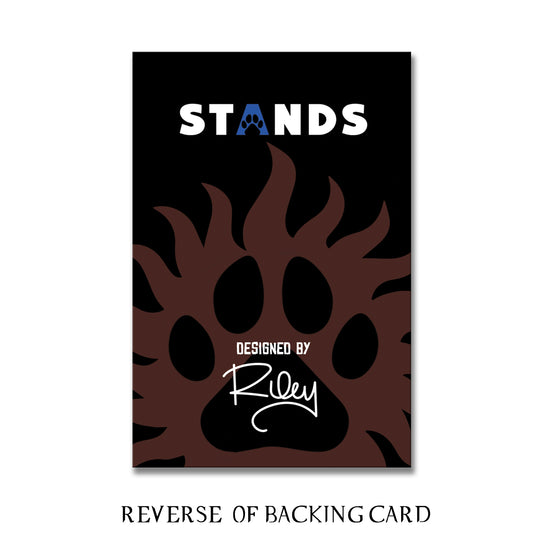 The back of the pin backing, which reads: "STANDS - Designed by Riley"