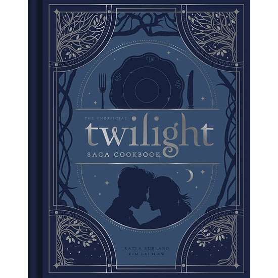 A dark blue book on a white background. The cover depicts the silhouettes of the main characters from the Twilight movies. At the corners are ornate drawings of bare trees. In the center is silver text that says "The unofficial twilight saga cookbook."