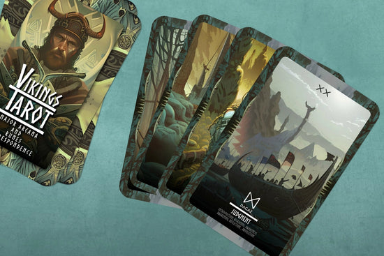 A collection of rectangular cards on a teal background. Each card displays a drawing of a Viking. On each card is a Nordic Rune, with the name and description of the Rune beneath it.