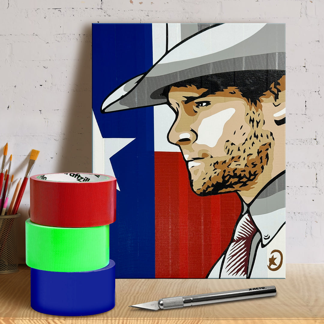 A poster against a white wall. The poster depicts the Walker from the TV series of the same name, against the texas flag, created with colored duct tape. Next to the poster are rolls of colored duct tape and cutting tools.