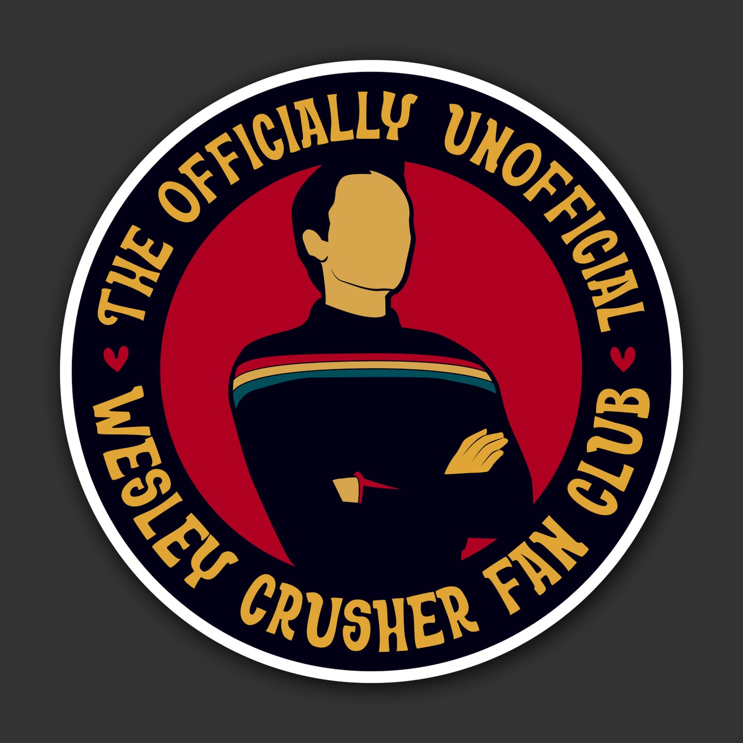 Circular sticker with 'The Officially Unofficial Wesley Crusher Fan Club' text and a silhouette of a character in a red and blue uniform.