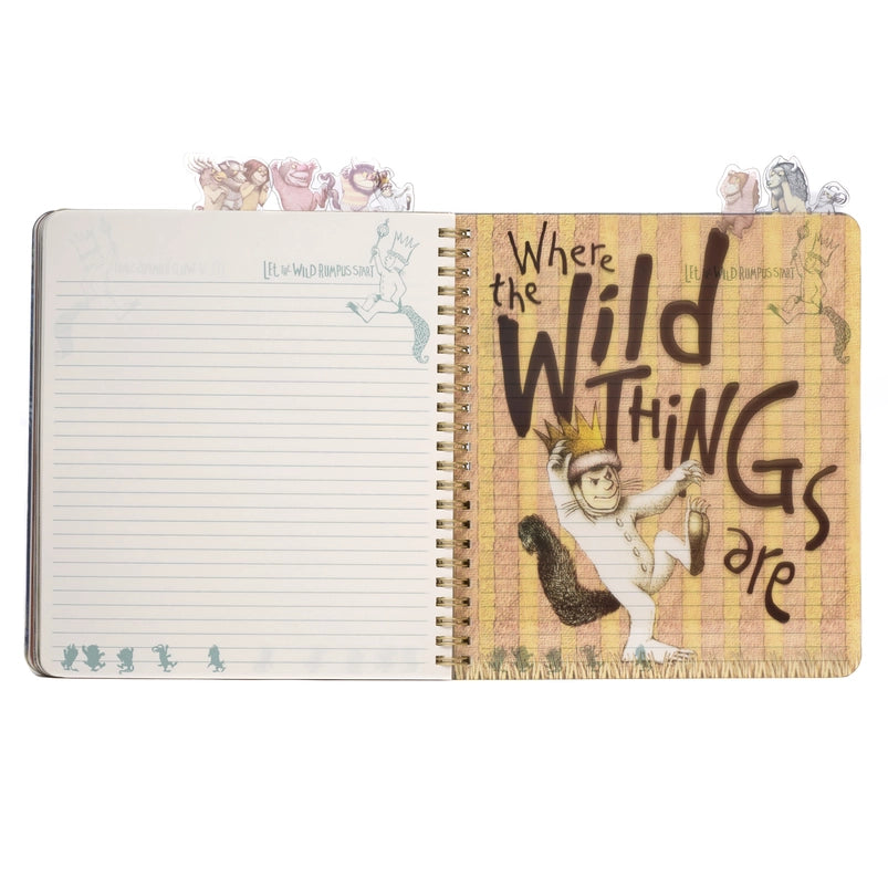 A page from the book showing Max on a yellow striped background, carrying a scepter. Black text says "where the wild things are." At the top of the journal are tabs depicting characters from the book.