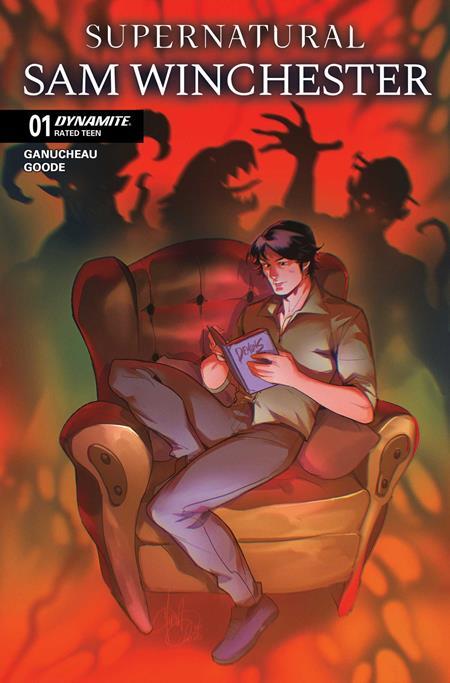 Comic book cover for 'Supernatural Sam Winchester' issue 01, published by Dynamite. The cover art features an illustrated young man sitting in a red armchair reading a book, with shadowy figures reaching out from a fiery orange and red background.
