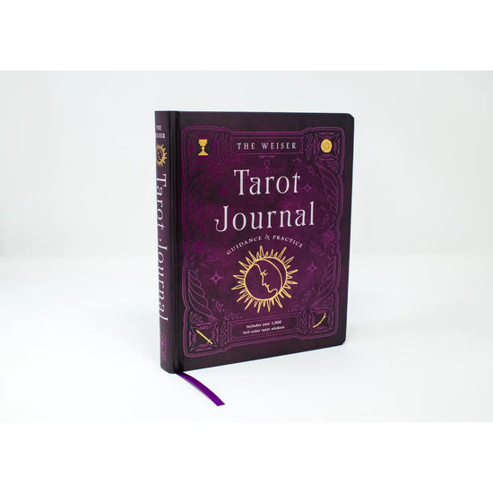 A zoomed-out view of The Weiser Tarot Journal, which also reads "Guidance and Practice - Includes over 1900 full-color Tarot stickers". The cover is a deep purple with sigil-like illustrations.