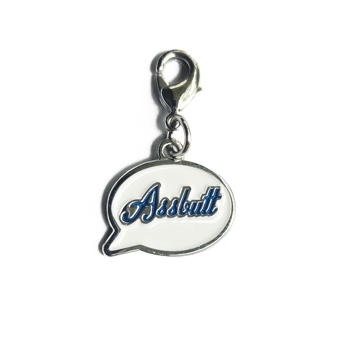 A silver charm with a white front in the shape of a speech bubble. The word "Assbutt" is written in blue script font.