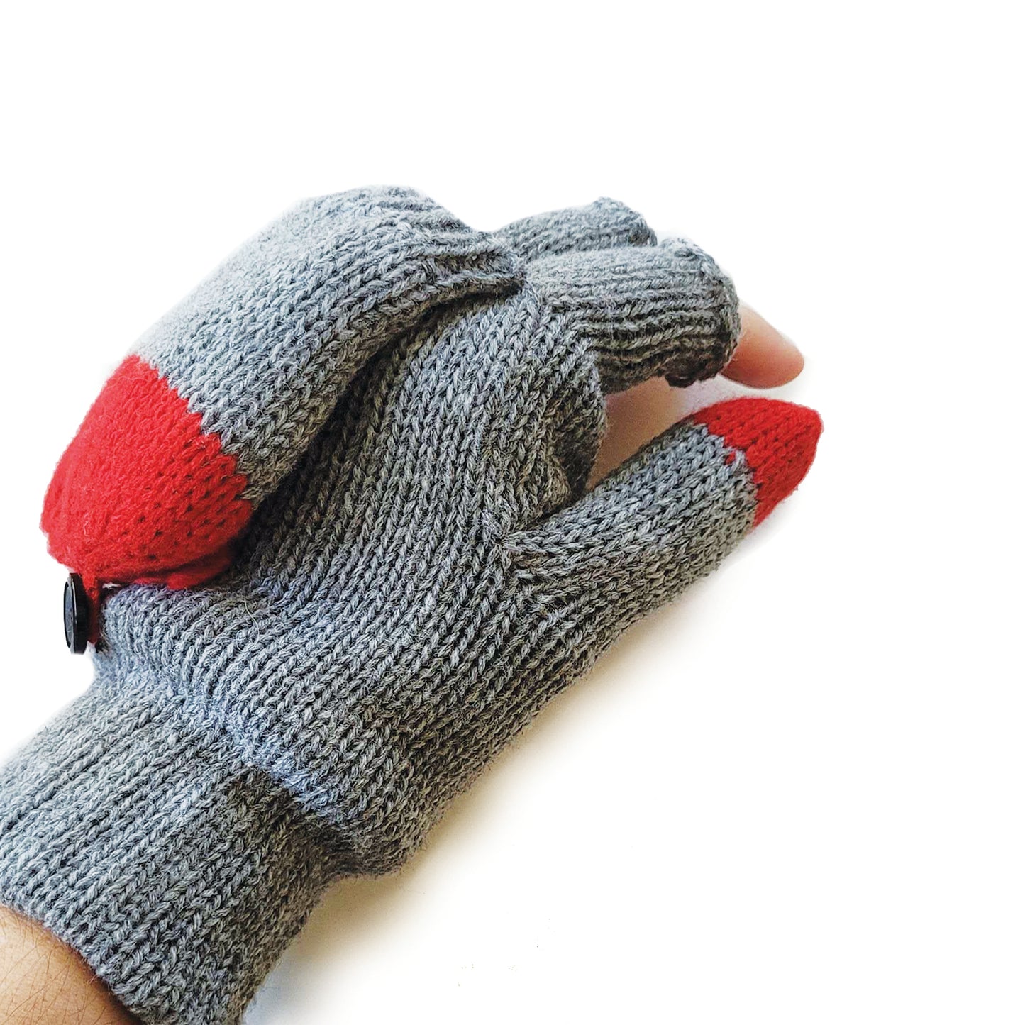 Load image into Gallery viewer, Right side view: A set of knit grey flip-top mittens, each with two blue button &amp;#39;eyes&amp;#39; sewn onto the flip top. Red yarn forms a sock puppet &amp;#39;mouth&amp;#39; at the top and there is red-and-yellow yarn &amp;#39;hair&amp;#39; sewn below the knuckles. The mitten portion covered the fingertips is flipped back. 
