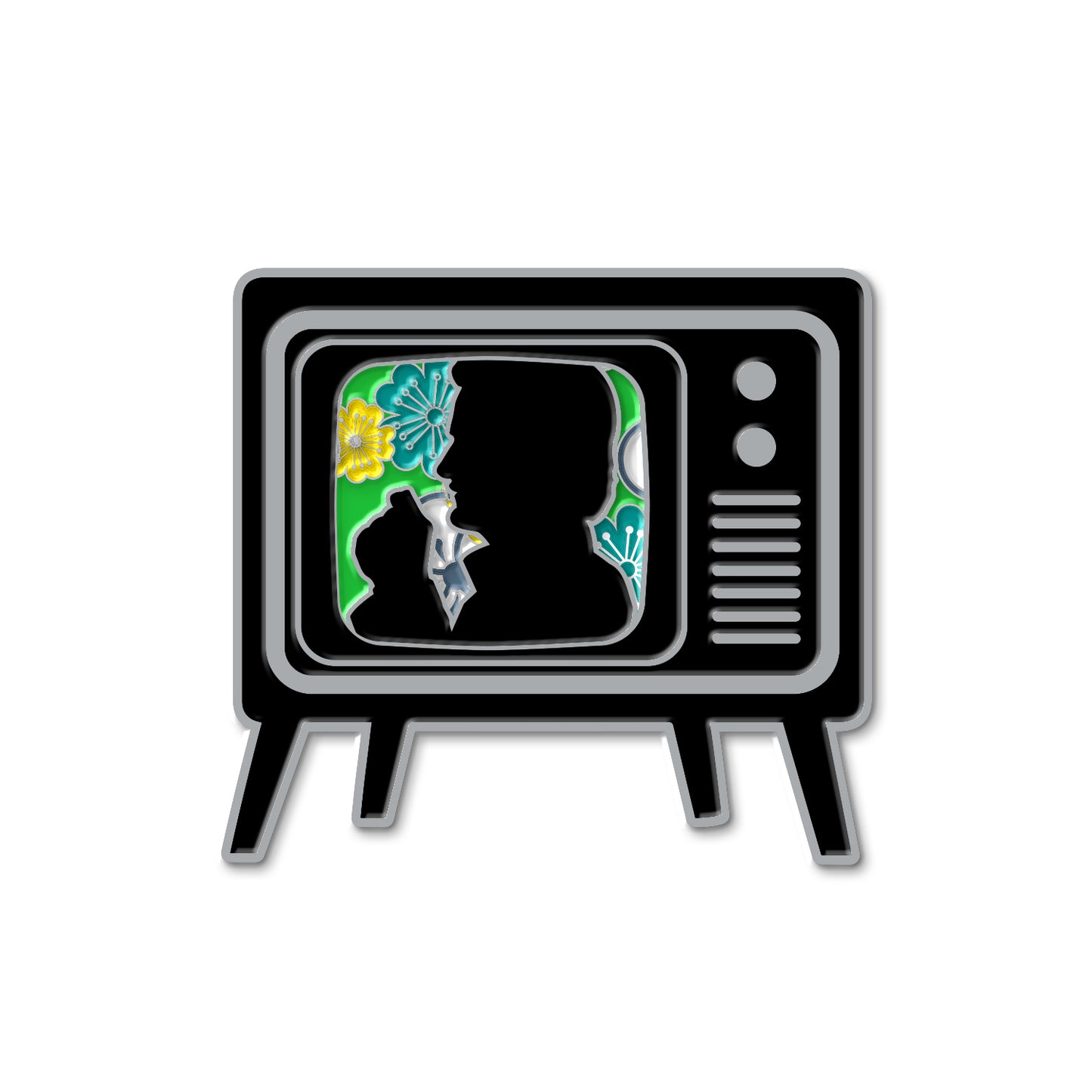 Load image into Gallery viewer, A brass pin in the shape of an old TV set, on a white background. On the screen is a black silhouette of the Trickster character from Supernatural, surrounded by green and yellow flowers.

