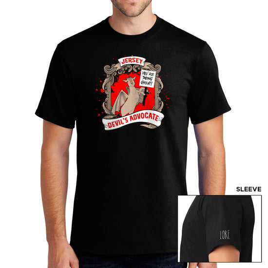 Load image into Gallery viewer, A male model wears a black t-shirt with an illustration of a jersey devil goat holding up a sign that says &amp;quot;You&amp;#39;re doing great!&amp;quot; and a title adorning it that says &amp;quot;Jersey Devil&amp;#39;s Advocate. The left shoulder has the word LORE written in white.
