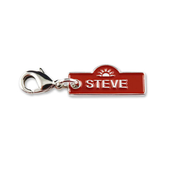 A red name tag with the name STEVE printed in the center in white text, and a white rising sun motif above the name.